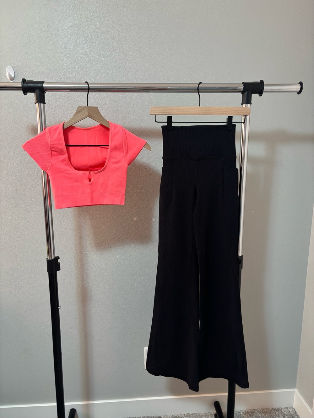 Athleta High-Waist Black Flare Pants with Aerie Neon Pink Crop Top